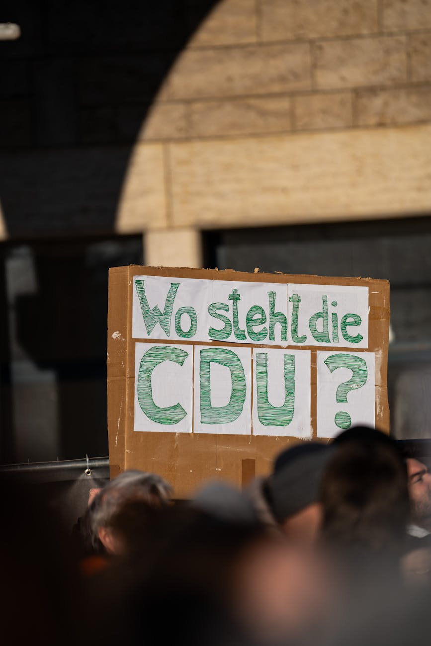 poster on a street demonstration