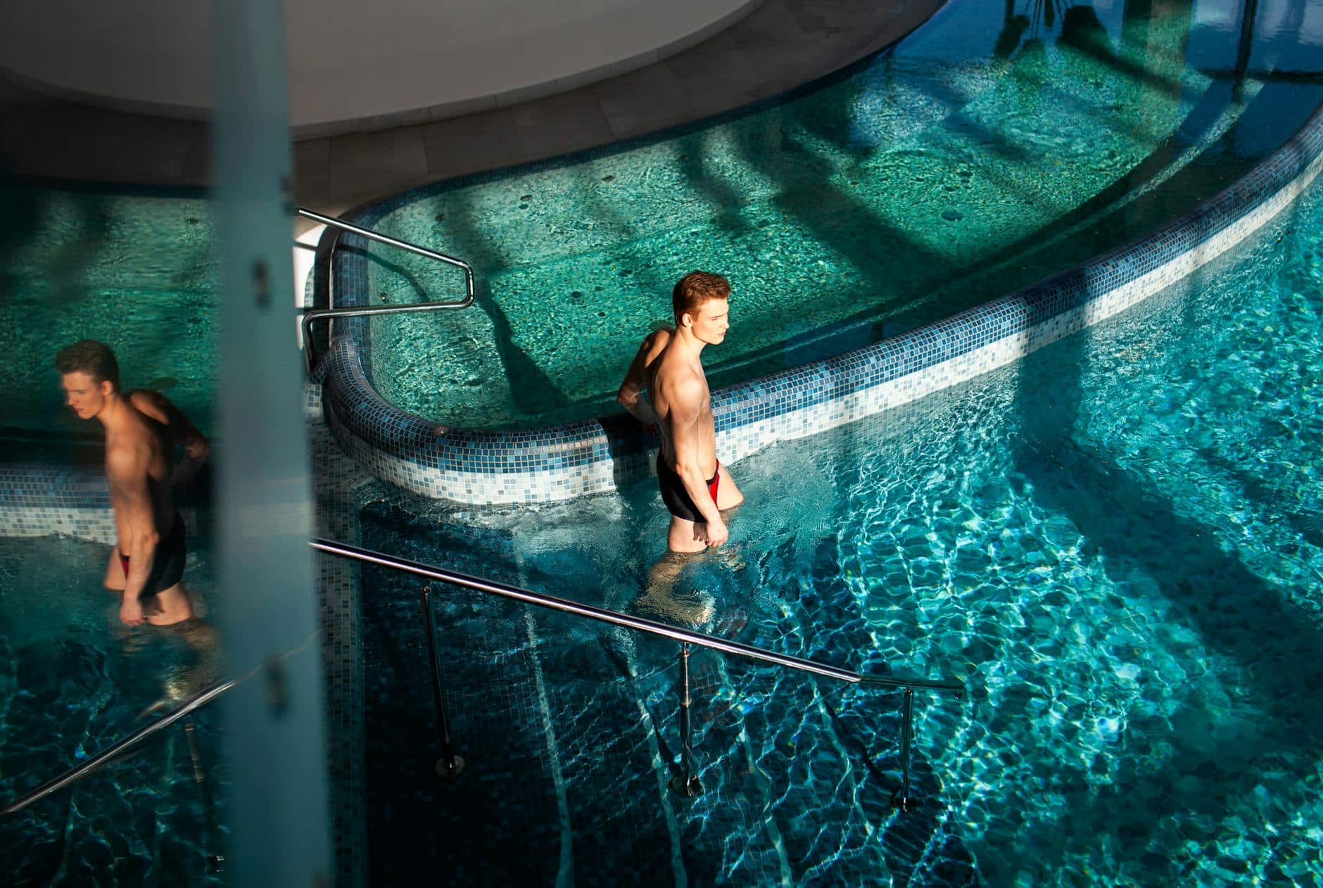 a man in a swimming pool